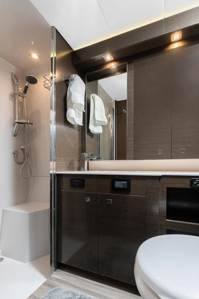 Slide: The Image of Luxurious bathroom in 2018 Cruisers Yachts 50 Cantius with modern fixtures and sleek design. - 13