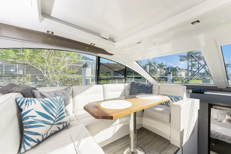 Slide: The Image of Luxurious interior of 2018 Cruisers Yachts 50 Cantius with elegant seating and scenic views. - 36