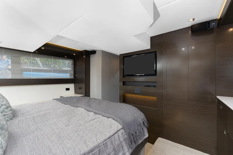 Slide: The Image of Luxurious bedroom interior of 2018 Cruisers Yachts 50 Cantius with modern design and TV. - 7