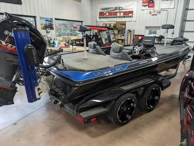 Slide: The Image of 2018 Skeeter FX20 bass boat in showroom, featuring Yamaha outboard motor. - 3