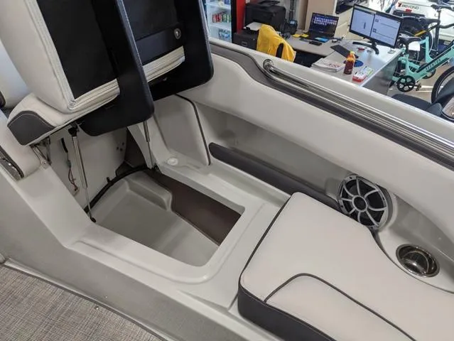 Slide: The Image of Interior of 2023 Crownline 240 SS boat with seating and speaker. - 17