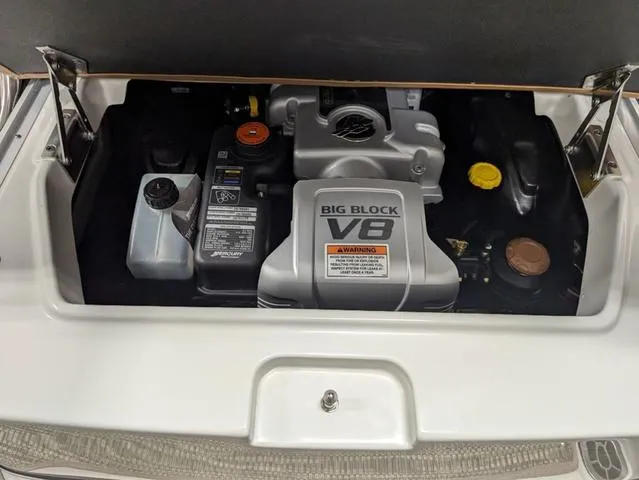 Slide: The Image of 2024 Crownline 290 SS engine compartment with Big Block V8 engine. - 11