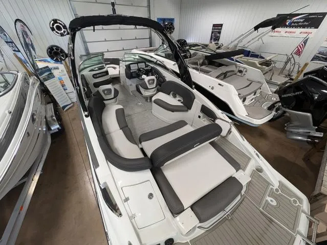 Slide: The Image of 2024 Crownline 280 SS boat interior with modern seating and sleek design. - 10
