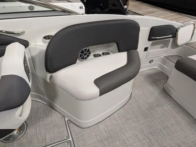 Slide: The Image of 2024 Crownline 280 SS boat interior with gray and white seating. - 13