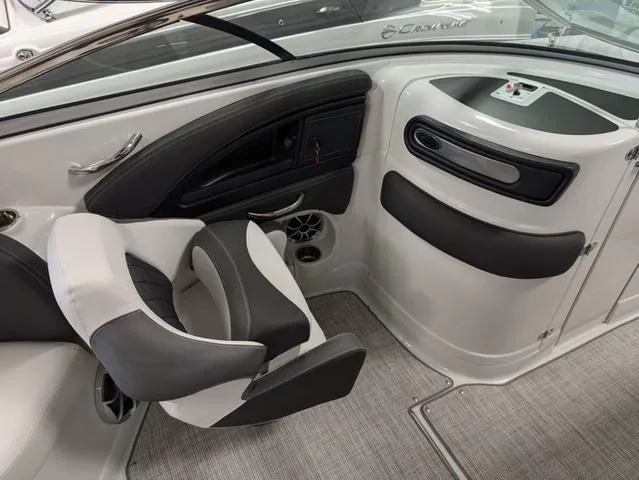 Slide: The Image of 2024 Crownline 280 SS boat interior with sleek seating and modern design. - 16