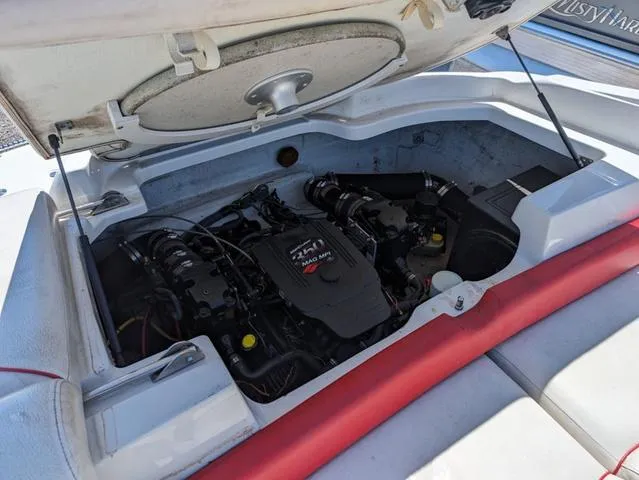 Slide: The Image of 2006 Crownline 220 LS boat engine compartment with open hatch. - 10