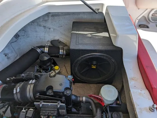 Slide: The Image of Engine compartment of 2006 Crownline 220 LS boat with subwoofer and components. - 11