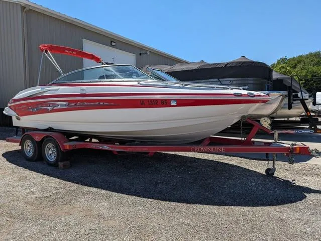 Slide: The Image of 2006 Crownline 220 LS boat on trailer, parked outdoors. - 20