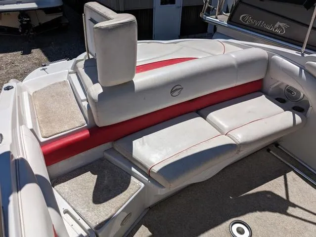 Slide: The Image of 2006 Crownline 220 LS boat interior with white and red seating. - 9