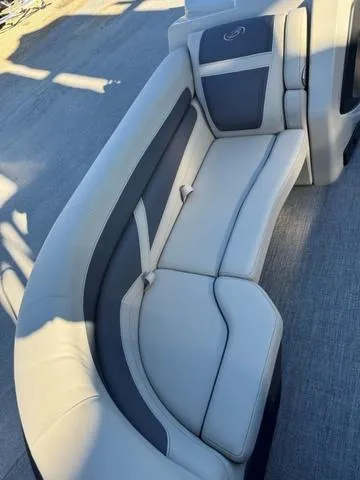 Slide: The Image of 2023 Barletta Boats C22UC interior seating with gray and white upholstery. - 4