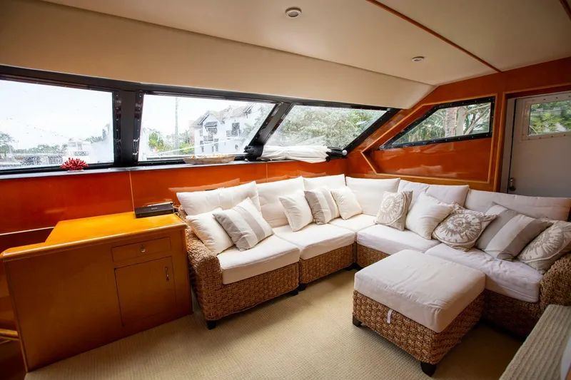 Slide: The Image of Luxurious 1999 Tarrab Motoryacht interior with plush seating and large windows. - 10