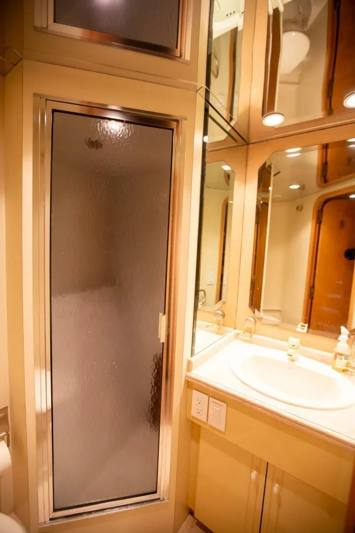 Slide: The Image of Luxurious bathroom in 1999 Tarrab Motoryacht with shower and vanity. - 12