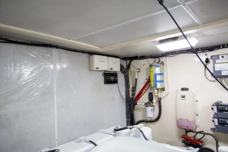Slide: The Image of Engine room of 1999 Tarrab Motoryacht with equipment and wiring. - 45