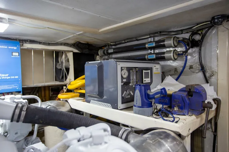 Slide: The Image of Engine room of 1999 Tarrab Motoryacht with equipment and tools. - 46