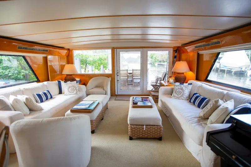 Slide: The Image of Luxurious interior of 1999 Tarrab Motoryacht with elegant seating and large windows. - 6