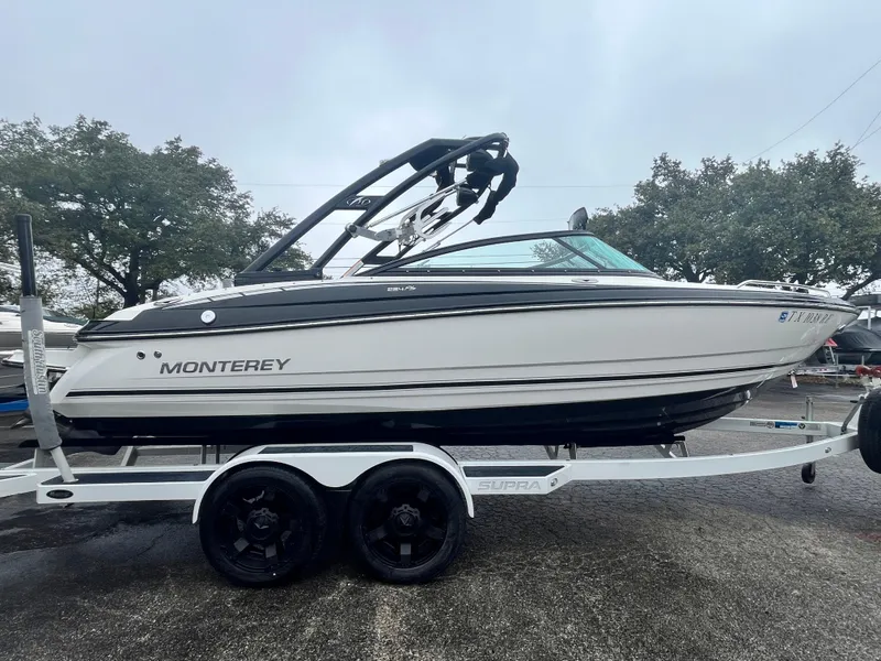 The Image of 2017 Monterey 224FS boat on trailer, side view, outdoors. - 0