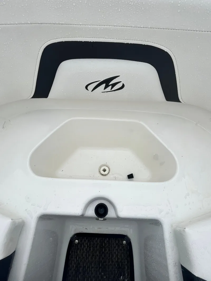 Slide: The Image of 2017 Monterey 224FS boat interior with logo and seating area. - 23