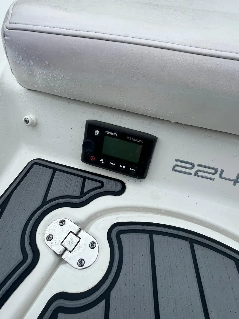 Slide: The Image of 2017 Monterey 224FS boat interior with control panel and seating. - 5