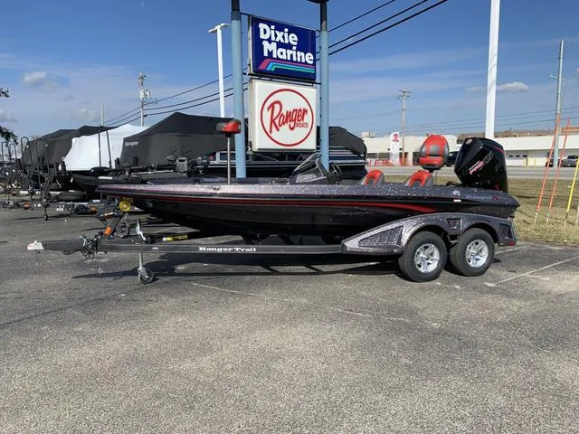 Slide: The Image of 2024 Ranger RZ519C boat on trailer at Dixie Marine dealership. - 1