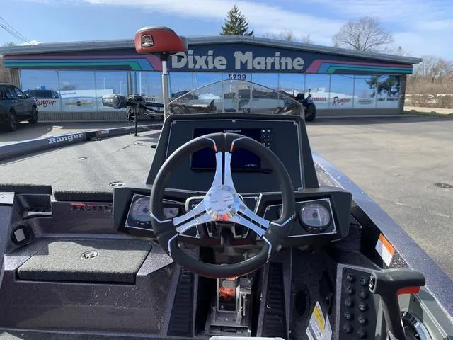 Slide: The Image of 2024 Ranger RZ519C boat dashboard at Dixie Marine dealership. - 4