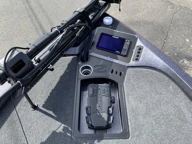 Slide: The Image of 2024 Ranger RZ519C boat dashboard with Lowrance electronics and control panel. - 6