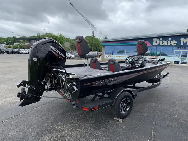 Slide: The Image of 2024 Ranger RT178C fishing boat with Mercury engine in parking lot. - 4