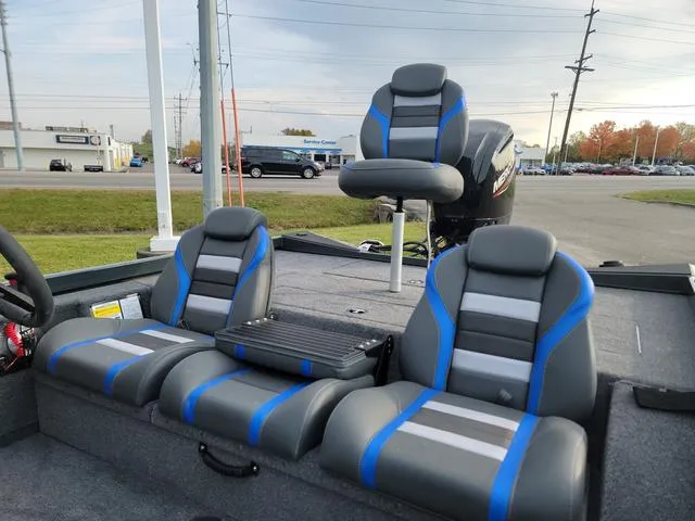 Slide: The Image of 2024 Ranger RT178 Ranger Cup boat interior with blue and gray seating. - 4
