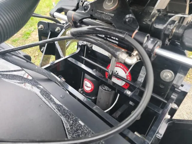 Slide: The Image of Close-up of 2025 Ranger Z520R Ranger Cup boat engine components. - 13