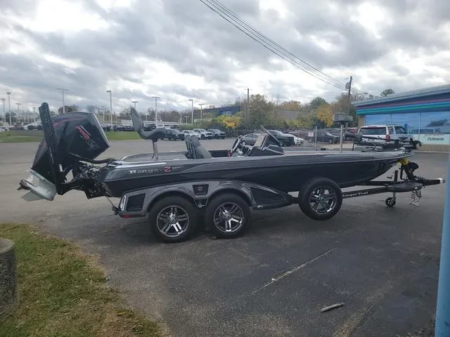 Slide: The Image of 2025 Ranger Z520R Ranger Cup boat on trailer, parked outdoors. - 17