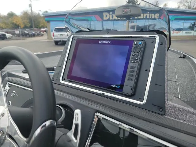 Slide: The Image of 2025 Ranger Z520R boat dashboard with Lowrance HDS display at dealership. - 7