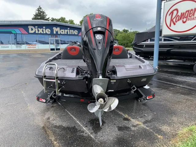 Slide: The Image of 2025 Ranger Z185 boat at Dixie Marine dealership, rear view with motor and propeller. - 5