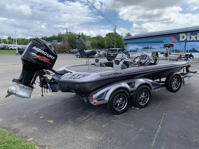 Slide: The Image of 2015 Ranger Z521C bass boat with Mercury Pro XS engine in parking lot. - 6