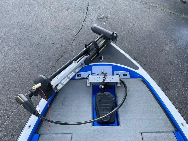 Slide: The Image of 2009 Stratos 285XL boat with trolling motor on deck. - 3