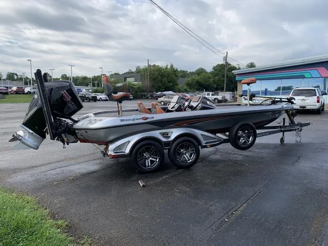 Slide: The Image of 2019 Ranger Z521C bass boat on trailer in parking lot. - 4