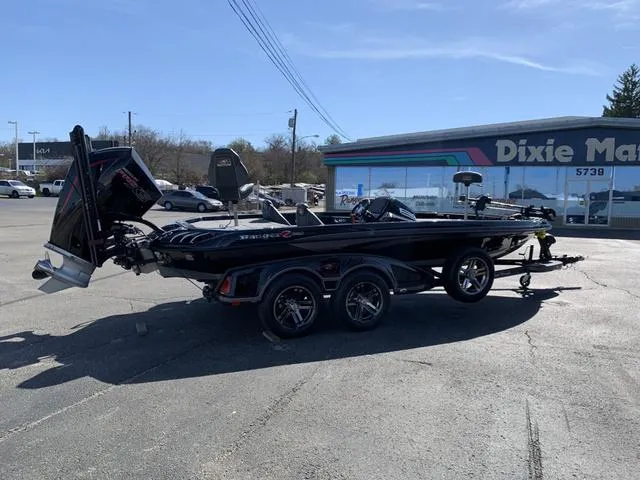 Slide: The Image of 2020 Ranger Z520C boat parked outside Dixie Marine dealership. - 5