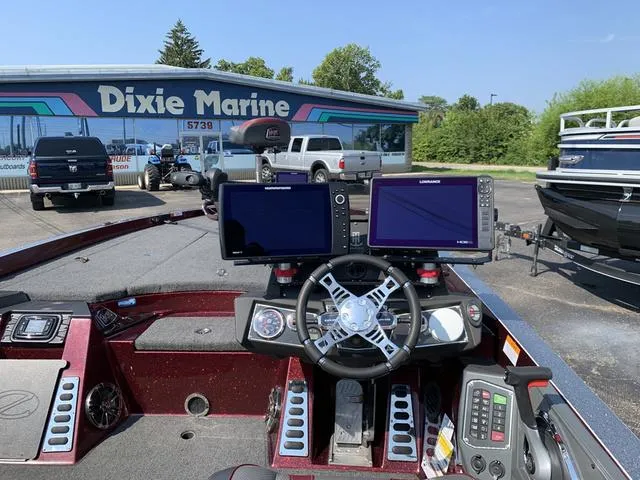Slide: The Image of 2020 Ranger Z520L CUP boat dashboard with dual screens at Dixie Marine dealership. - 4