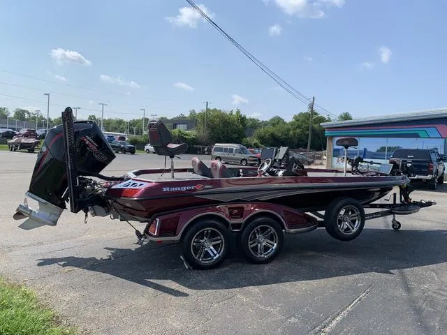 Slide: The Image of 2020 Ranger Z520L CUP bass boat parked outdoors on a sunny day. - 5