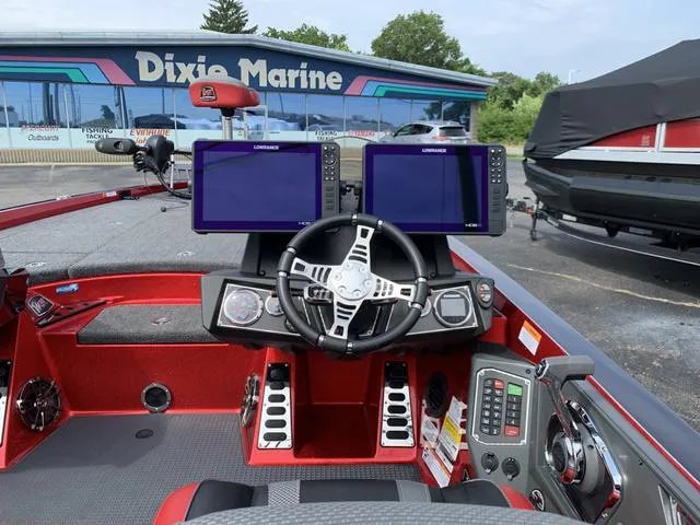 Slide: The Image of 2020 Ranger Z521L boat dashboard with dual Lowrance displays at Dixie Marine. - 3