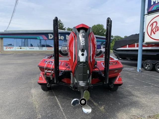 Slide: The Image of 2020 Ranger Z521L boat, red, rear view with powerful outboard motor. - 4