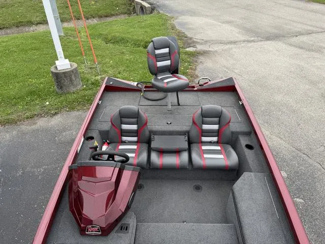 Slide: The Image of 2019 Ranger RT178 boat interior with red and gray seating, steering console, and spacious deck. - 5
