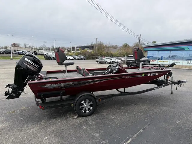 Slide: The Image of 2019 Ranger RT178 boat with Mercury engine on trailer in parking lot. - 6