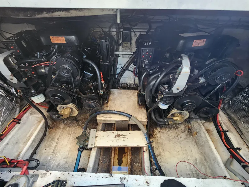 Slide: The Image of Engine compartment of 1999 Cruisers Yachts 3375 Esprit with dual engines. - 28
