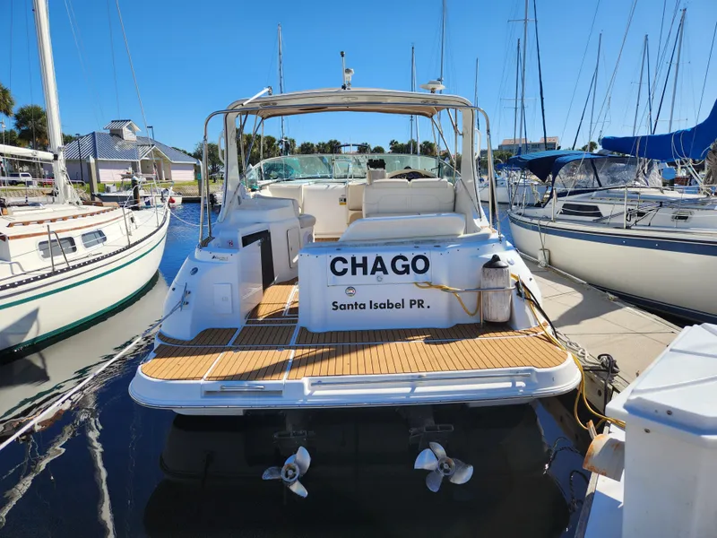 Slide: The Image of 1999 Cruisers Yachts 3375 Esprit docked, rear view, named "Chago," Santa Isabel PR. - 5
