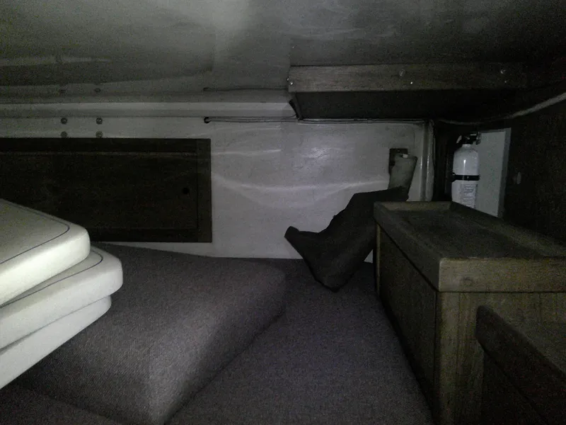 Slide: The Image of Interior cabin of 1984 Catalina 36' sloop with cushions and storage. - 23