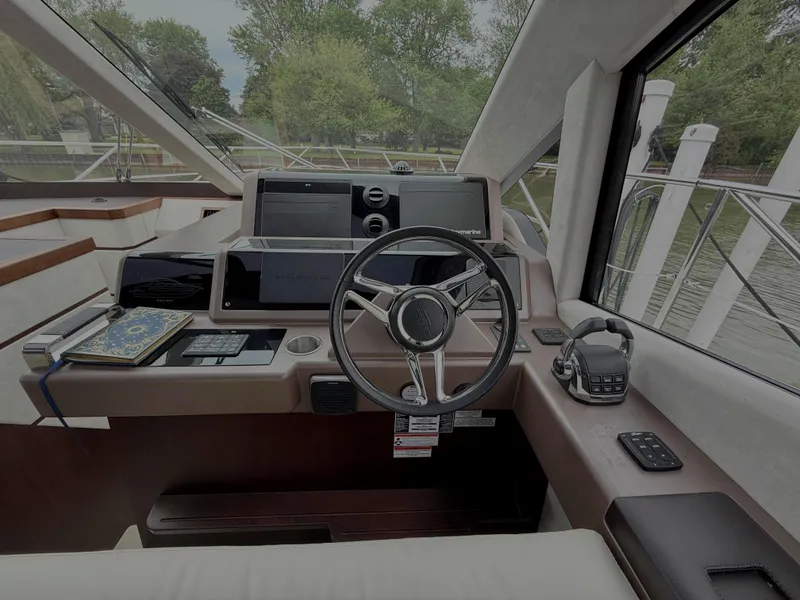 Slide: The Image of Helm of 2018 Galeon 560 Sky yacht with modern navigation equipment. - 28