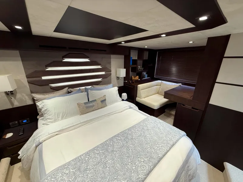 Slide: The Image of Luxurious bedroom interior of 2018 Galeon 560 Sky yacht with modern design and cozy furnishings. - 34