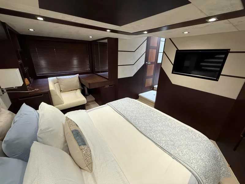 Slide: The Image of Luxurious bedroom interior of 2018 Galeon 560 Sky yacht with modern decor and cozy seating. - 35