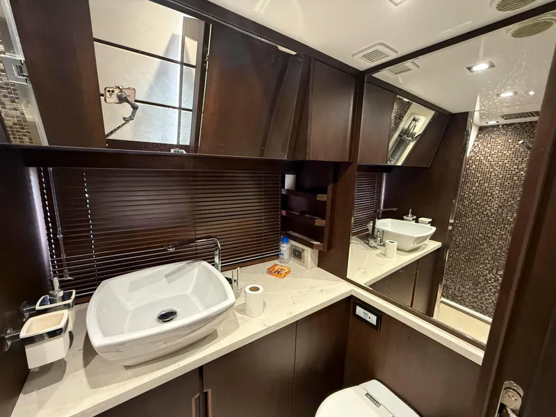 Slide: The Image of Luxurious bathroom interior of 2018 Galeon 560 Sky yacht with modern fixtures and elegant design. - 37