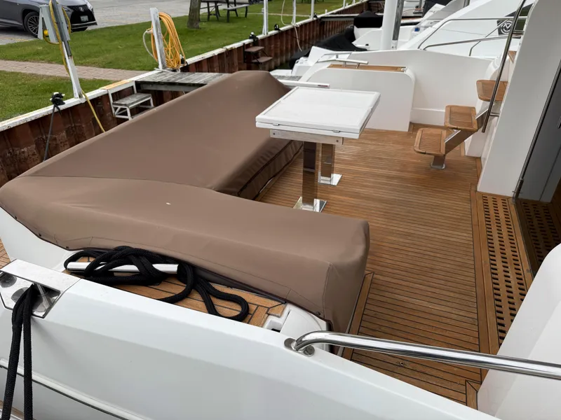 Slide: The Image of Luxury deck of 2018 Galeon 560 Sky yacht with seating and table. - 4