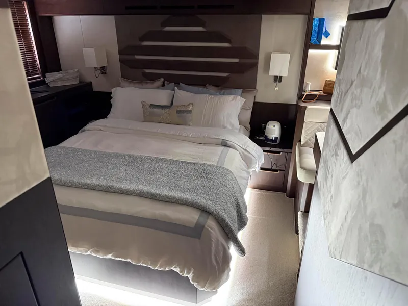 Slide: The Image of Luxurious bedroom interior of 2018 Galeon 560 Sky yacht with modern decor and cozy bedding. - 46